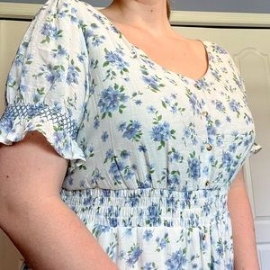 Floral dress, Blue and green floral pattern, gold buttons, Short puff sleeves.